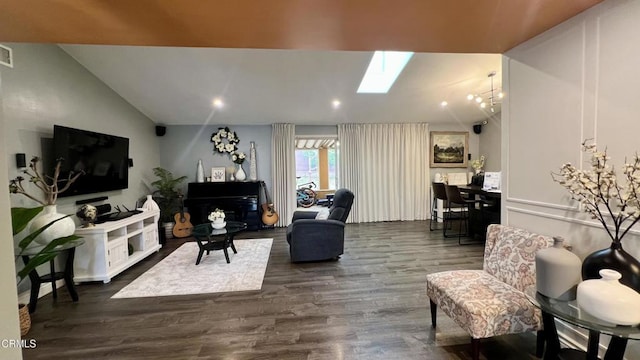 16041 Jersey St, Granada Hills, CA 91344 - living room with visible vents, lofted ceiling with skylight, recessed lighting, dark wood finished floors, and a notable chandelier