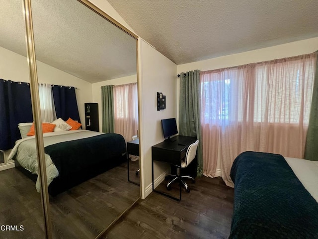 16041 Jersey St, Granada Hills, CA 91344 - bedroom with dark wood-type flooring, baseboards, a textured ceiling, and lofted ceiling
