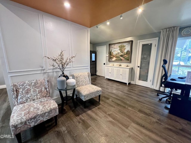 16041 Jersey St, Granada Hills, CA 91344 - home office featuring a decorative wall, baseboards, dark wood-style floors, rail lighting, and vaulted ceiling
