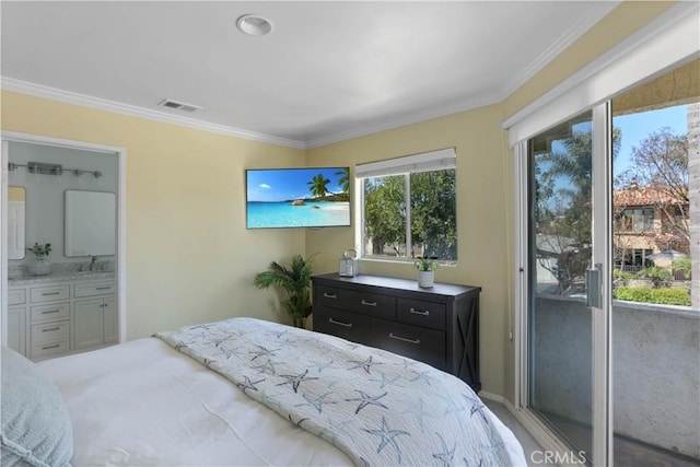 bedroom with crown molding, visible vents, and connected bathroom