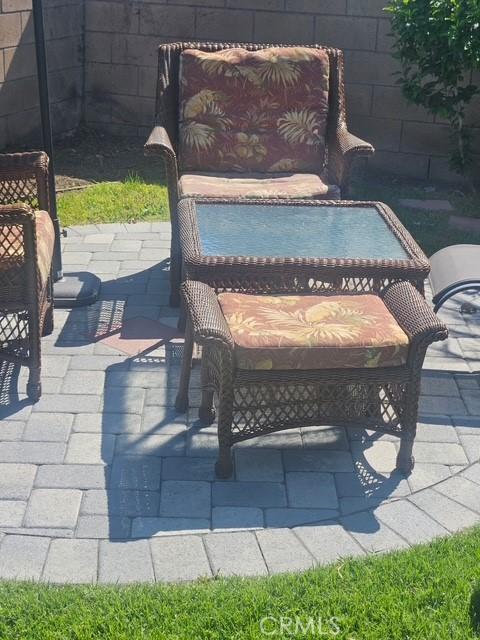 view of patio featuring fence