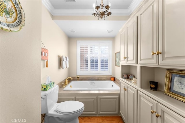 1215 Mira Monte Dr, Redlands, CA 92373 - bathroom featuring toilet, ornamental molding, a garden tub, wood finished floors, and a chandelier