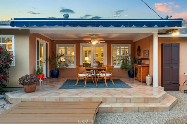 1215 Mira Monte Dr, Redlands, CA 92373 - patio terrace at dusk with outdoor dining area and ceiling fan