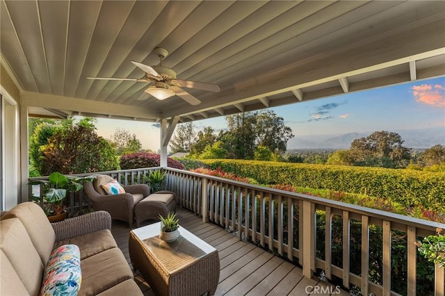 1215 Mira Monte Dr, Redlands, CA 92373 - wooden terrace with ceiling fan and an outdoor living space