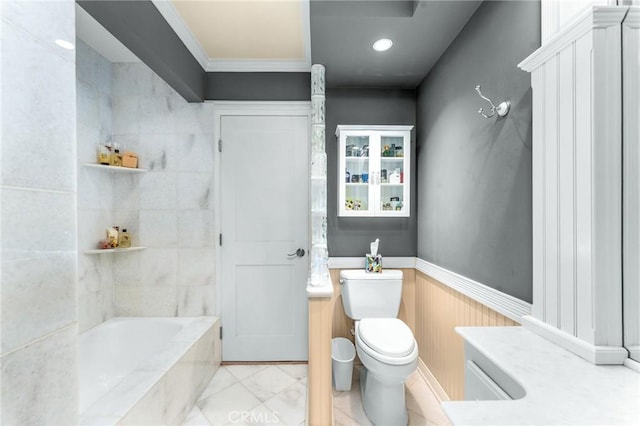 1215 Mira Monte Dr, Redlands, CA 92373 - full bath featuring ornamental molding, toilet,  shower combination, and wainscoting