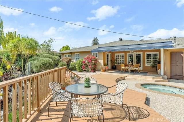 1215 Mira Monte Dr, Redlands, CA 92373 - back of property featuring outdoor dining area, stucco siding, french doors, roof with shingles, and a patio area