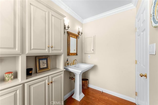 1215 Mira Monte Dr, Redlands, CA 92373 - bathroom featuring wood finished floors, crown molding, and baseboards