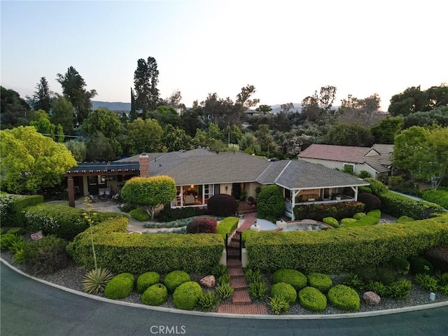 1215 Mira Monte Dr, Redlands, CA 92373 - single story home with a chimney