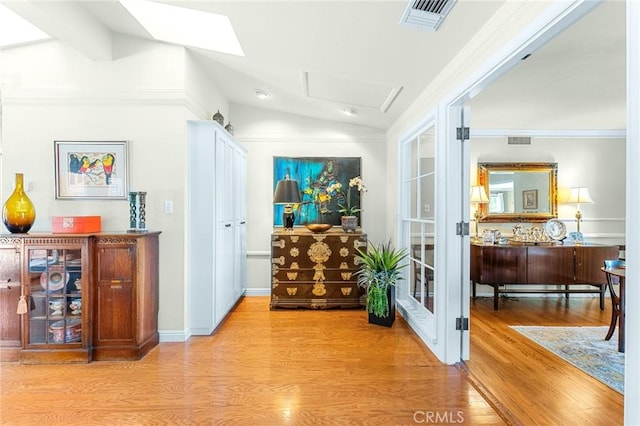 1215 Mira Monte Dr, Redlands, CA 92373 - hall featuring lofted ceiling, wood finished floors, and baseboards