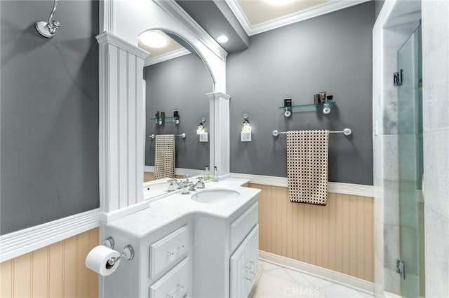 1215 Mira Monte Dr, Redlands, CA 92373 - bathroom featuring wainscoting, ornamental molding, decorative columns, vanity, and an enclosed shower