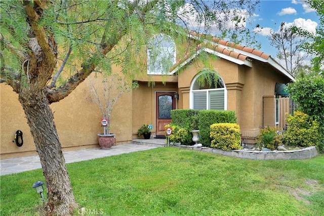 11818 Mount Harvard Ct, Rancho Cucamonga, CA 91737 - view of front of home featuring stucco siding and a front yard