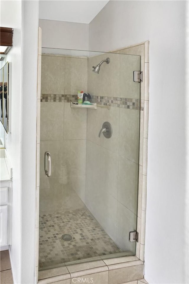 11818 Mount Harvard Ct, Rancho Cucamonga, CA 91737 - full bathroom with a stall shower and tile patterned floors