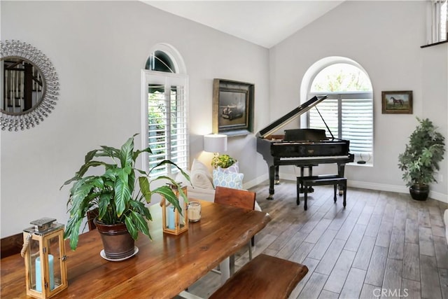 11818 Mount Harvard Ct, Rancho Cucamonga, CA 91737 - sitting room featuring vaulted ceiling, wood finished floors, and baseboards