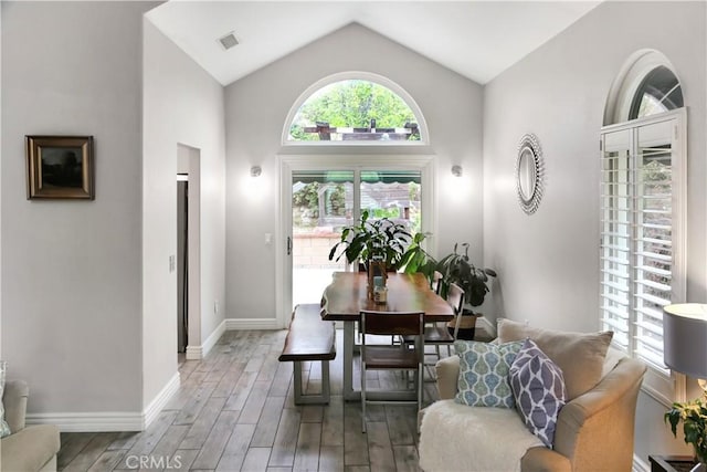11818 Mount Harvard Ct, Rancho Cucamonga, CA 91737 - dining space with wood finished floors and lofted ceiling