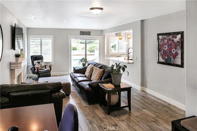 11818 Mount Harvard Ct, Rancho Cucamonga, CA 91737 - living area featuring wood finished floors