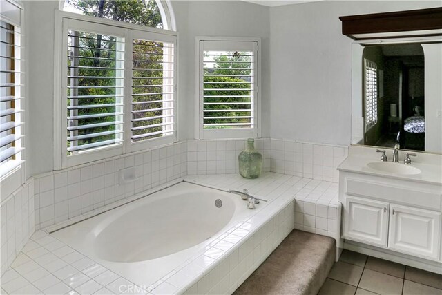 11818 Mount Harvard Ct, Rancho Cucamonga, CA 91737 - full bath featuring a garden tub, tile patterned floors, and vanity