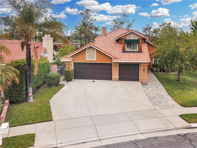 11818 Mount Harvard Ct, Rancho Cucamonga, CA 91737 - view of front of home featuring a chimney, a tile roof, stucco siding, concrete driveway, and an attached garage