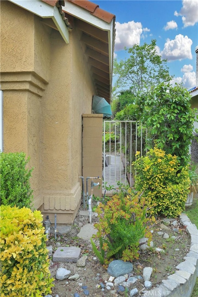11818 Mount Harvard Ct, Rancho Cucamonga, CA 91737 - view of side of property featuring stucco siding
