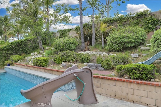 11818 Mount Harvard Ct, Rancho Cucamonga, CA 91737 - view of swimming pool with a water slide