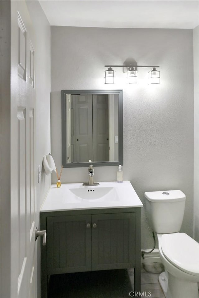 11818 Mount Harvard Ct, Rancho Cucamonga, CA 91737 - half bath featuring toilet and vanity