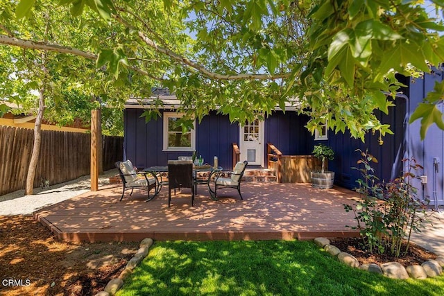 view of patio / terrace with fence and a wooden deck