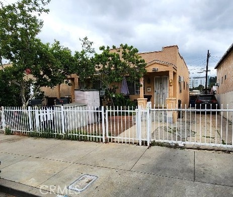 2043 City View Ave, Los Angeles, CA 90033 - view of front of home with a fenced front yard and stucco siding