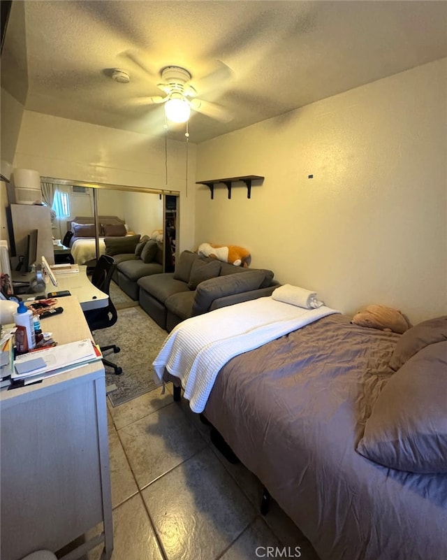 2043 City View Ave, Los Angeles, CA 90033 - bedroom featuring concrete floors, a textured ceiling, and ceiling fan