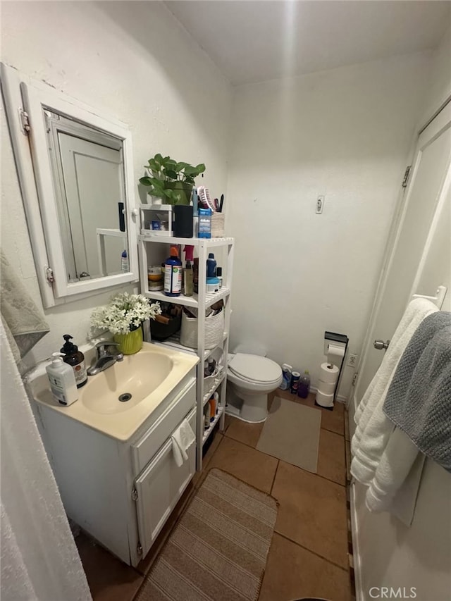 2043 City View Ave, Los Angeles, CA 90033 - half bath featuring toilet, tile patterned floors, and vanity