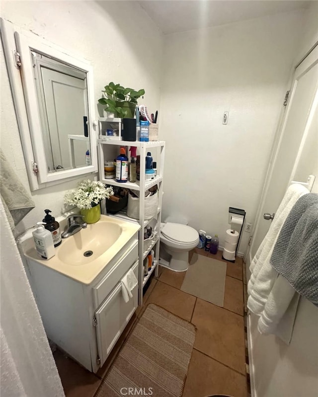 2043 City View Ave, Los Angeles, CA 90033 - bathroom featuring toilet, tile patterned flooring, and vanity