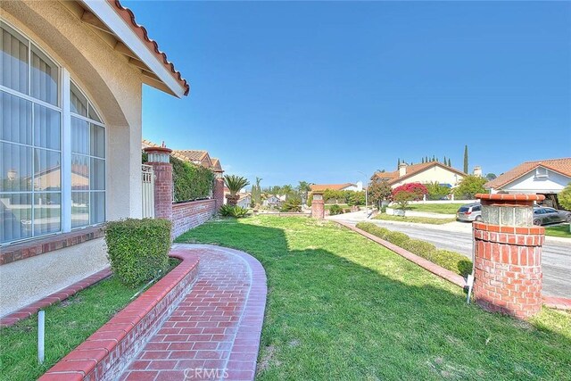 17527 Mondino Dr, Rowland Heights, CA 91748 - view of green lawn featuring a residential view