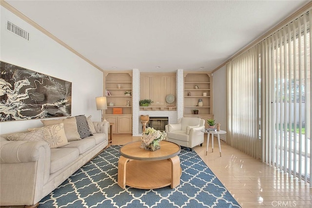 17527 Mondino Dr, Rowland Heights, CA 91748 - living area featuring a fireplace, built in shelves, and wood finished floors