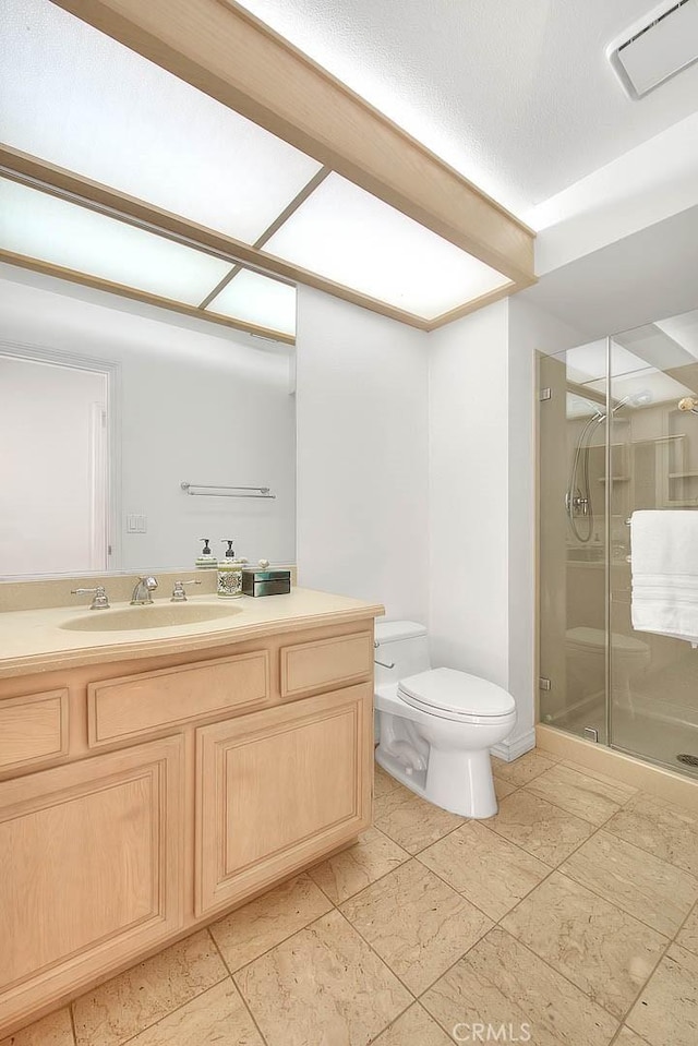 17527 Mondino Dr, Rowland Heights, CA 91748 - bathroom featuring toilet, vanity, and a stall shower
