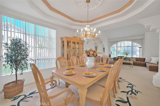 17527 Mondino Dr, Rowland Heights, CA 91748 - carpeted dining area with a raised ceiling, a chandelier, and crown molding