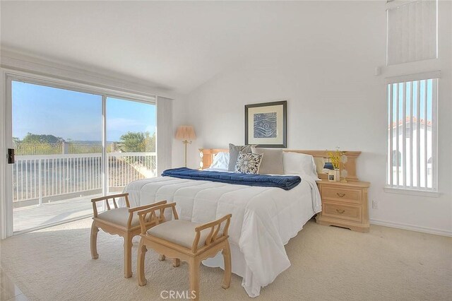 17527 Mondino Dr, Rowland Heights, CA 91748 - bedroom with access to exterior, vaulted ceiling, baseboards, and light carpet