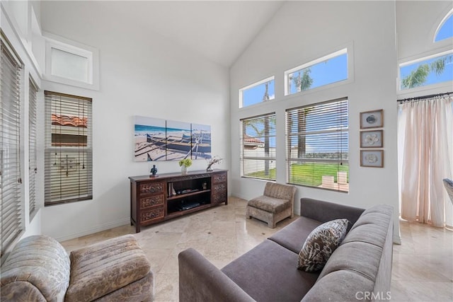 1081 Vista Lomas Ln, Corona, CA 92882 - living area featuring baseboards, high vaulted ceiling, and light tile patterned floors
