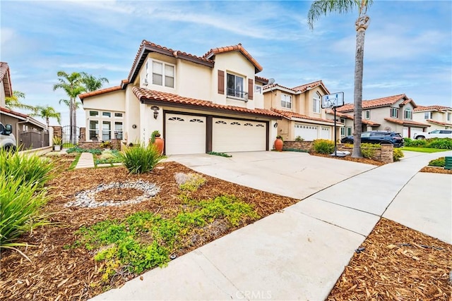 1081 Vista Lomas Ln, Corona, CA 92882 - mediterranean / spanish-style house featuring a tiled roof, an attached garage, stucco siding, a residential view, and concrete driveway