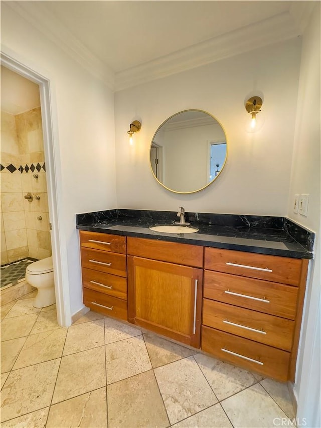 full bath with crown molding, a tile shower, vanity, tile patterned floors, and toilet