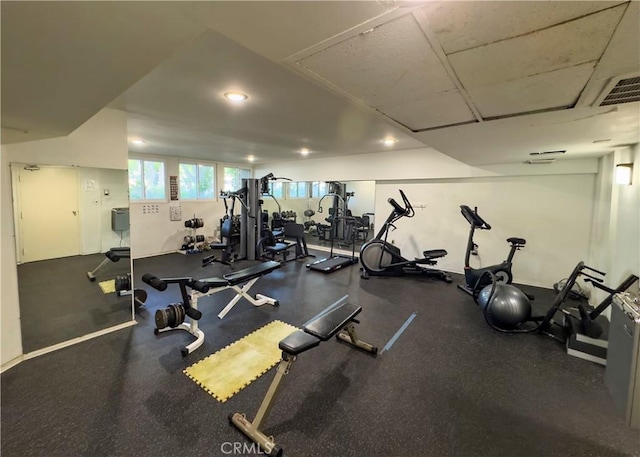workout area featuring recessed lighting and visible vents
