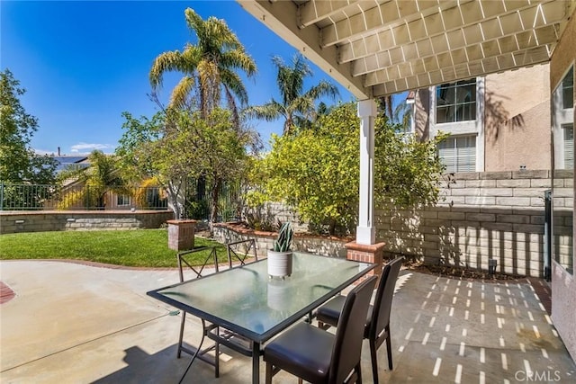 view of patio / terrace featuring outdoor dining area and a fenced backyard