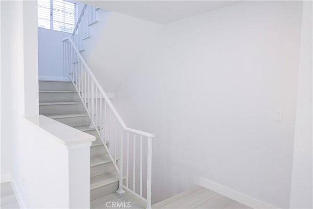 staircase with baseboards