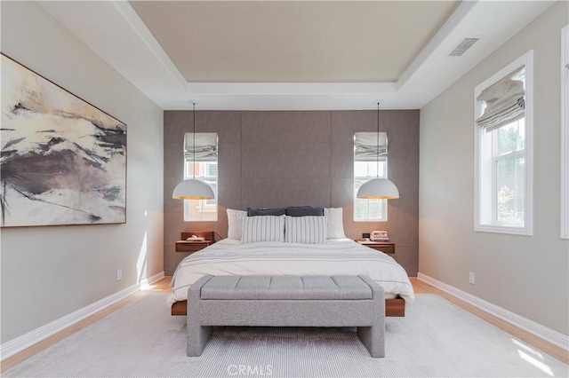 13 Goldenrod, Lake Forest, CA 92630 - bedroom featuring a tray ceiling and baseboards