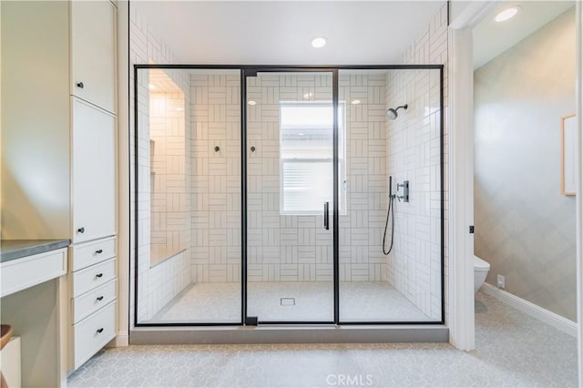 13 Goldenrod, Lake Forest, CA 92630 - full bathroom with a stall shower, toilet, baseboards, and recessed lighting