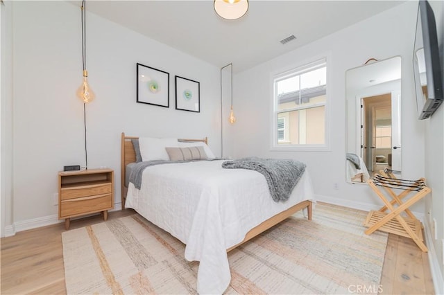 13 Goldenrod, Lake Forest, CA 92630 - bedroom featuring light wood-style flooring and baseboards