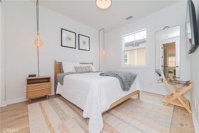 13 Goldenrod, Lake Forest, CA 92630 - bedroom featuring light wood-style floors and baseboards