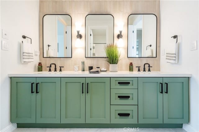 13 Goldenrod, Lake Forest, CA 92630 - bathroom featuring double vanity, baseboards, and tasteful backsplash