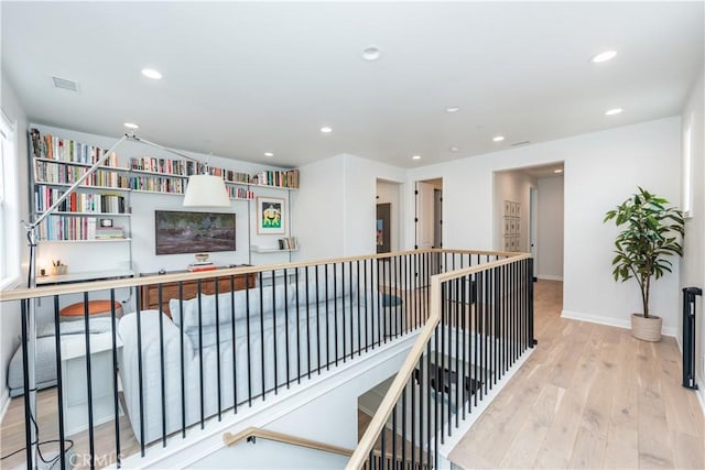 13 Goldenrod, Lake Forest, CA 92630 - hall with an upstairs landing, wood finished floors, baseboards, and recessed lighting
