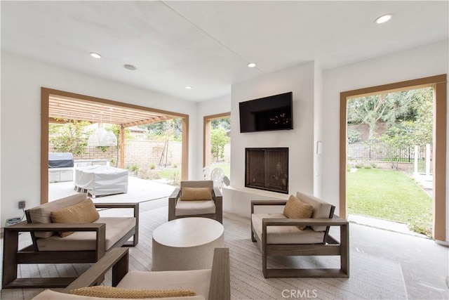 13 Goldenrod, Lake Forest, CA 92630 - living area with a fireplace with raised hearth and recessed lighting