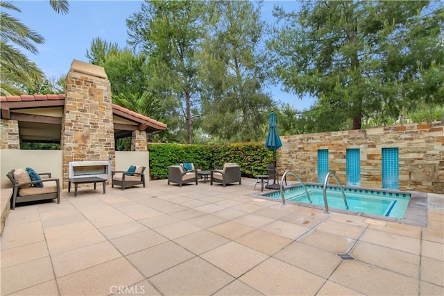 13 Goldenrod, Lake Forest, CA 92630 - view of swimming pool featuring a patio, a community hot tub, and an outdoor living space with a fireplace
