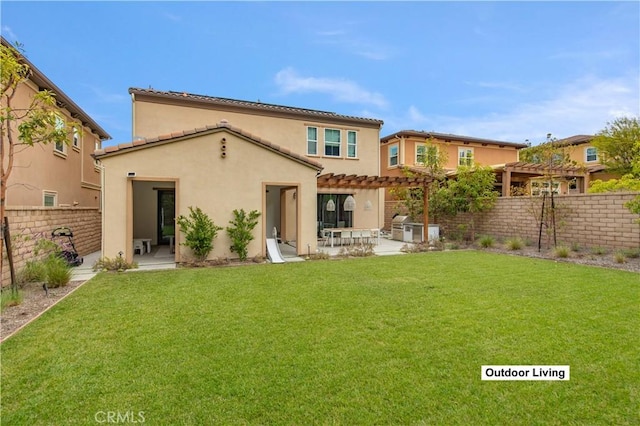 13 Goldenrod, Lake Forest, CA 92630 - rear view of property featuring a pergola, a patio area, stucco siding, and a tiled roof