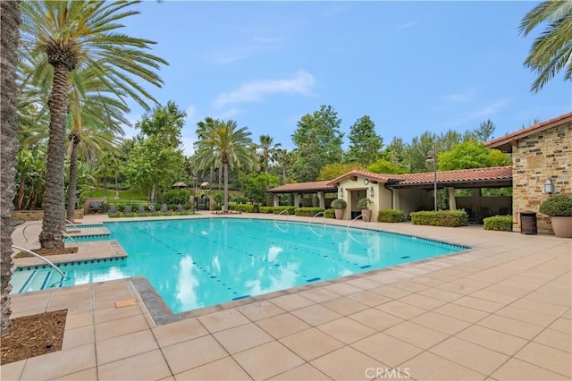 13 Goldenrod, Lake Forest, CA 92630 - community pool featuring a patio and view of scattered trees
